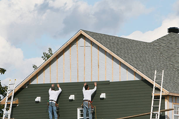 Professional Vinyl Siding technician working in Edgewood, PA